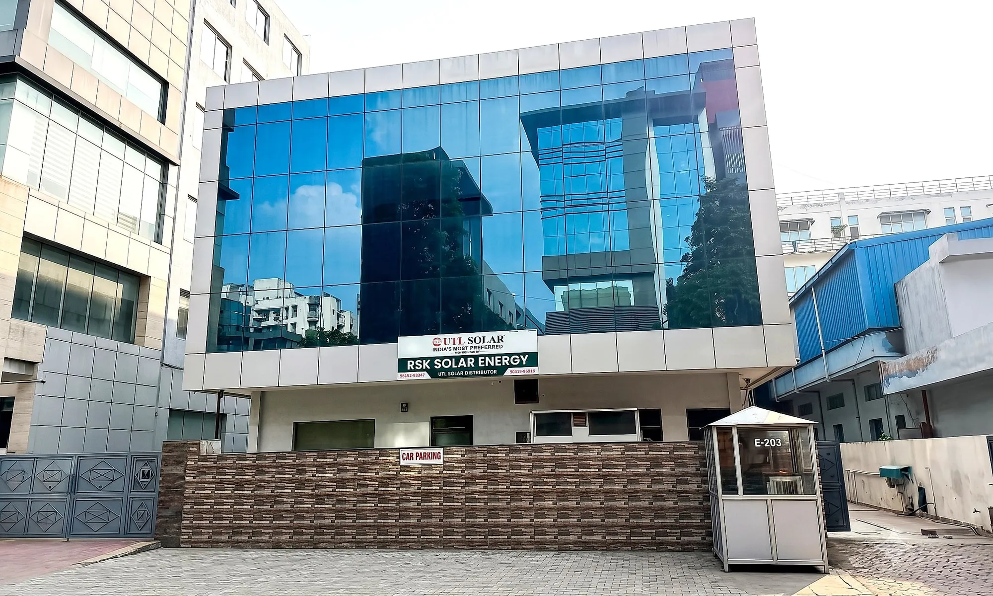 RSK Solar Energy office at E-203, Phase 8B Industrial Area, Mohali, with the UTL Solar distributor sign