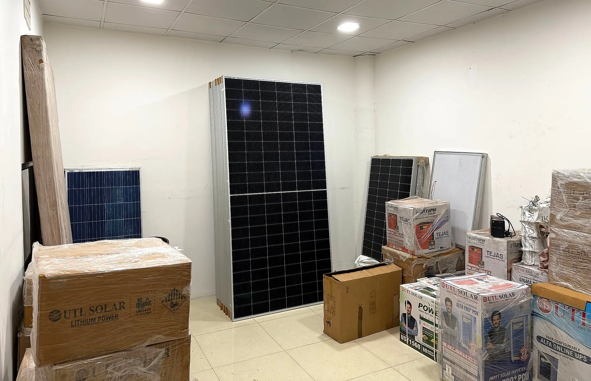 Solar panels, UTL lithium batteries and solar PCUs in the RSK Solar Energy store room